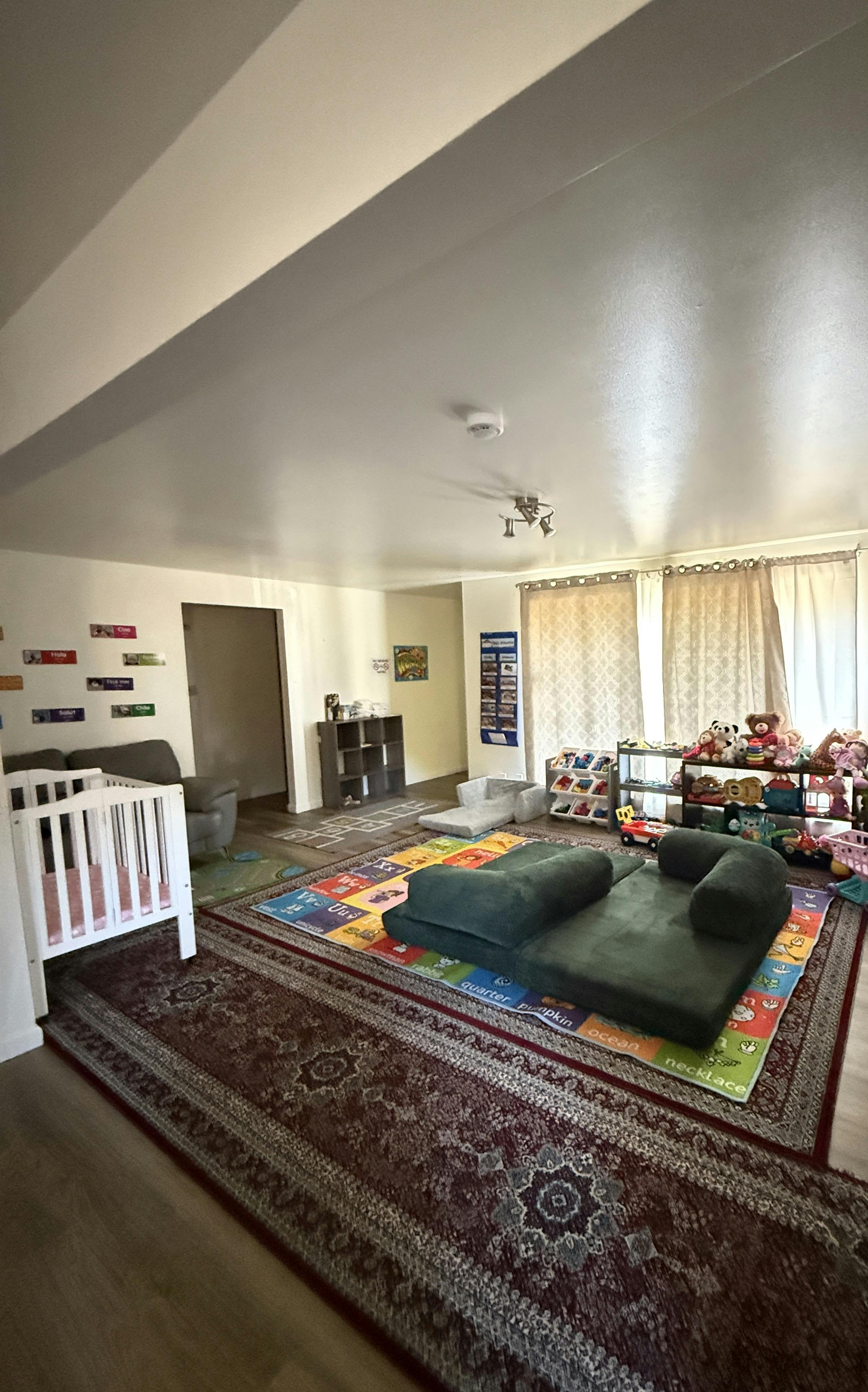Playroom with floor mats and toys
