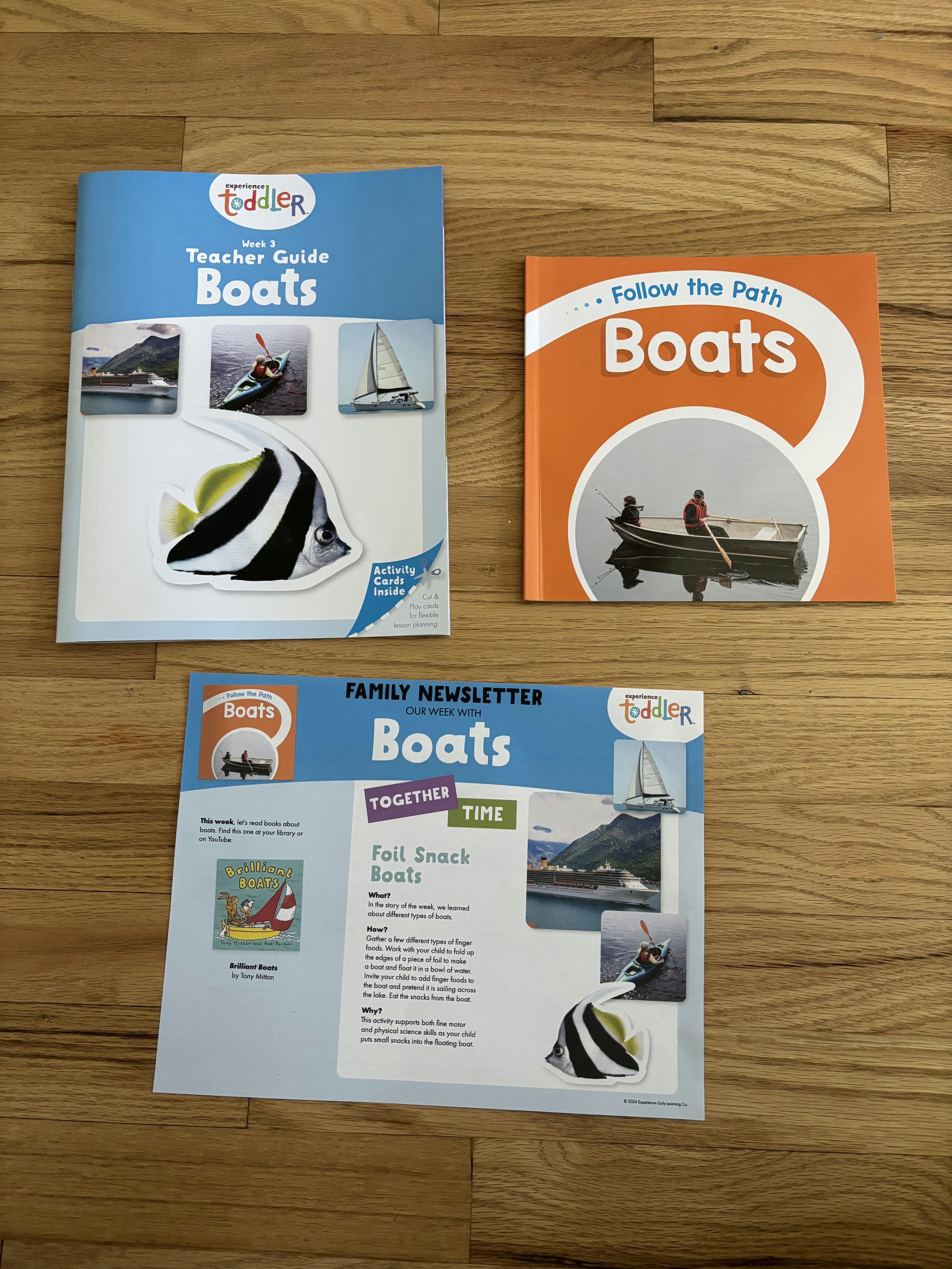 Three educational books and a newsletter about boats