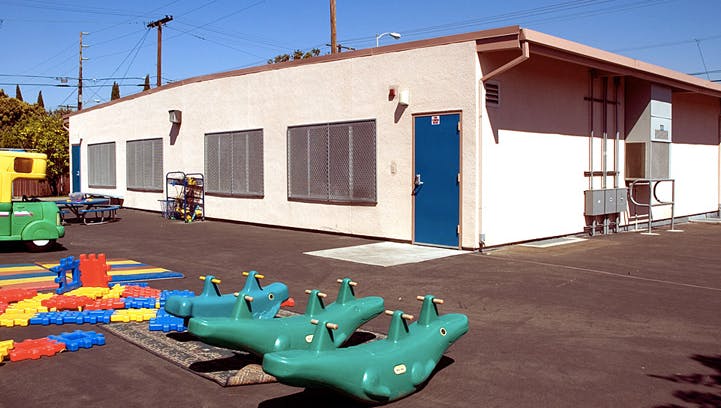 Playground with building and ride-on toys