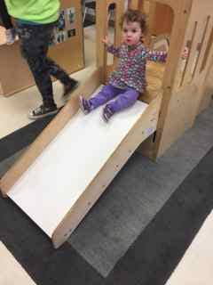 Child on a small slide