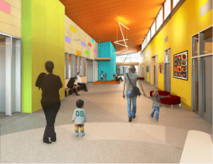 People and children walking in a colorful hallway