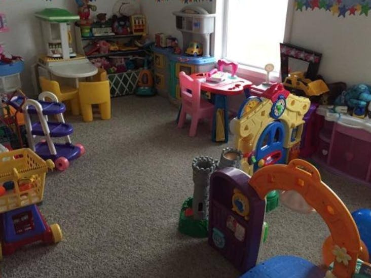 Playroom with colorful children's toys and furniture