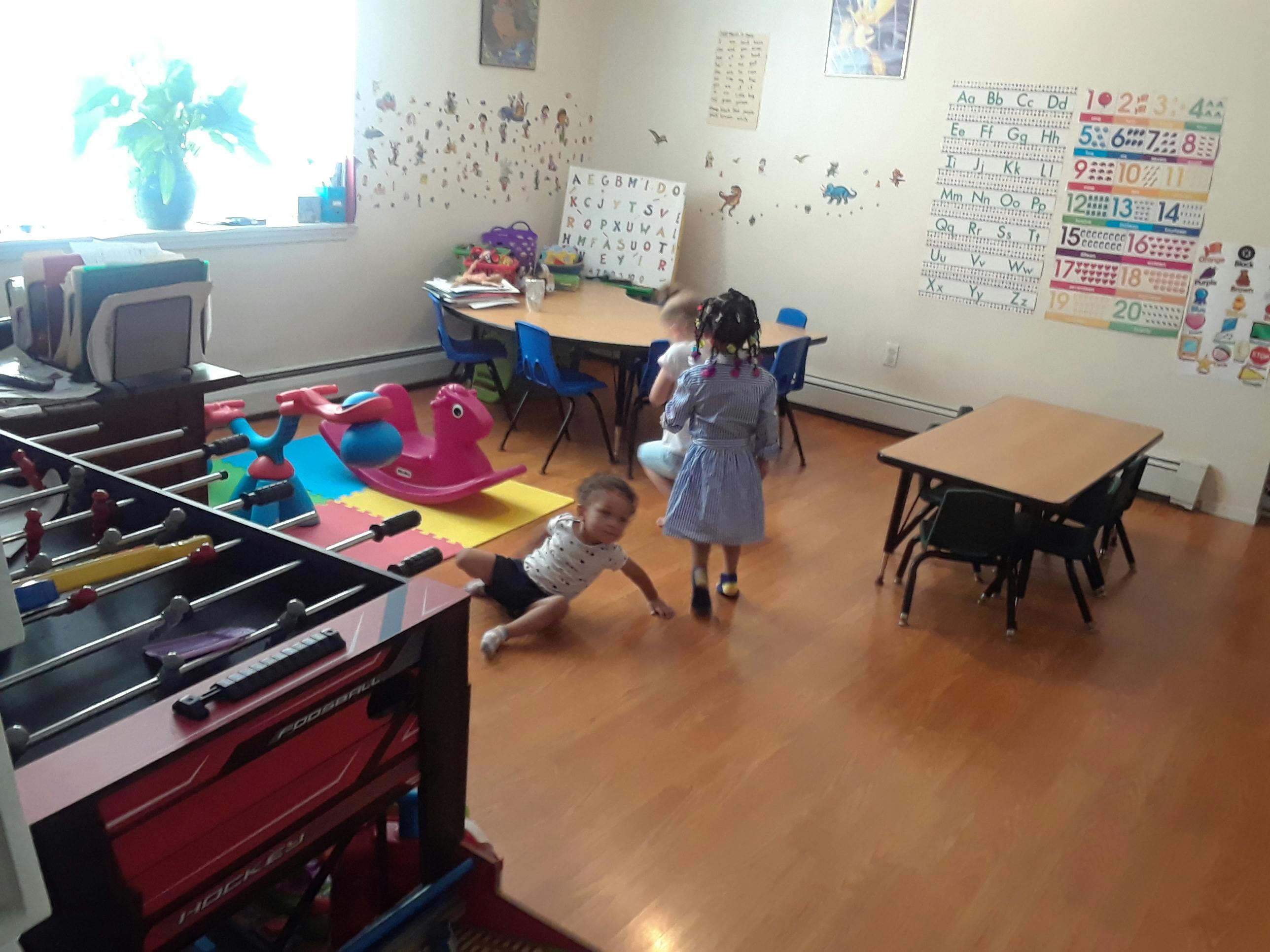 Children playing in a classroom