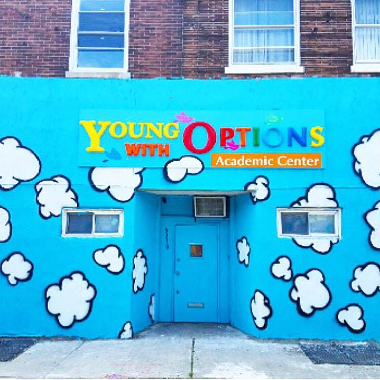 Building with "Young with Options Academic Center" sign