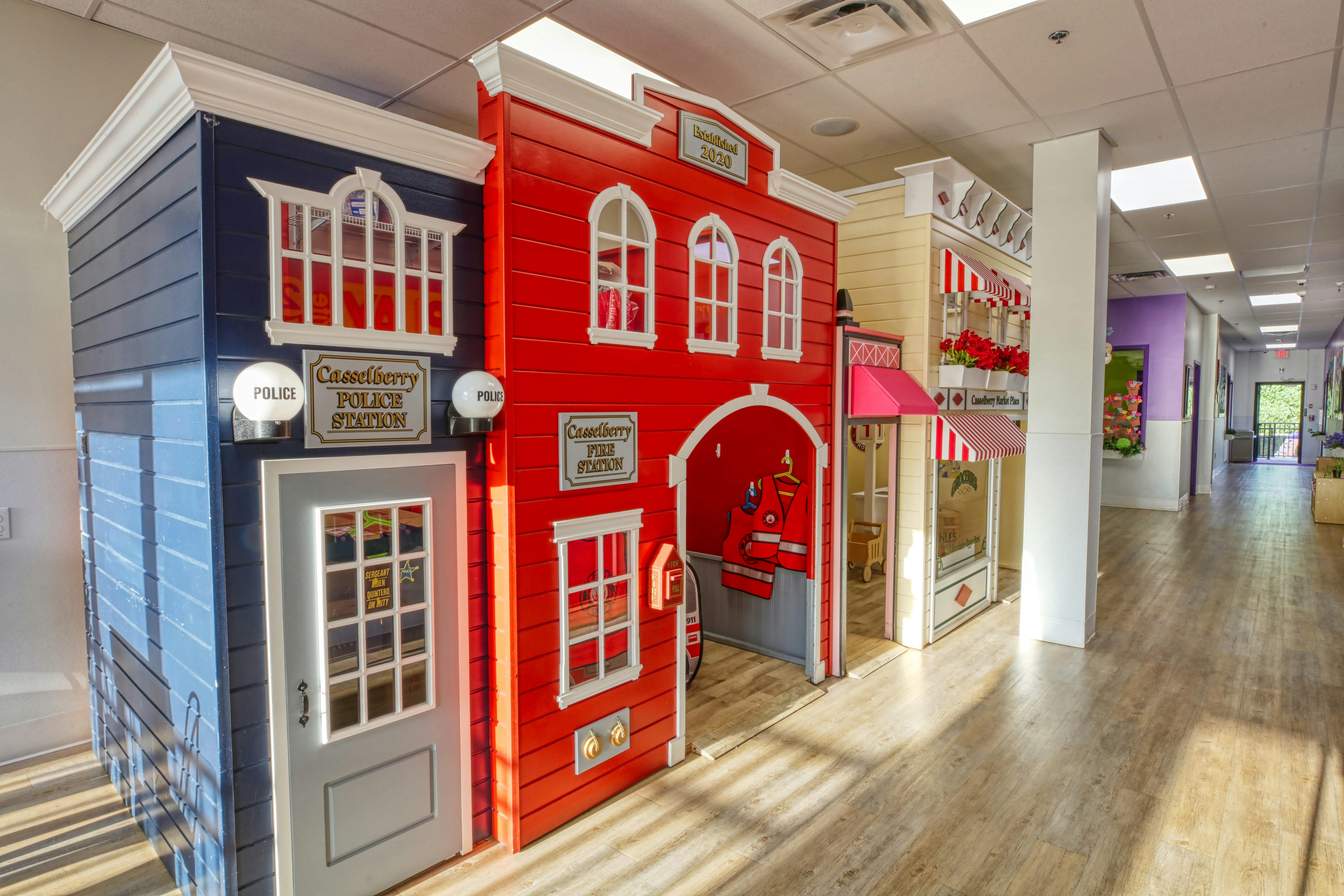 Play storefronts for a police station, fire station, and market
