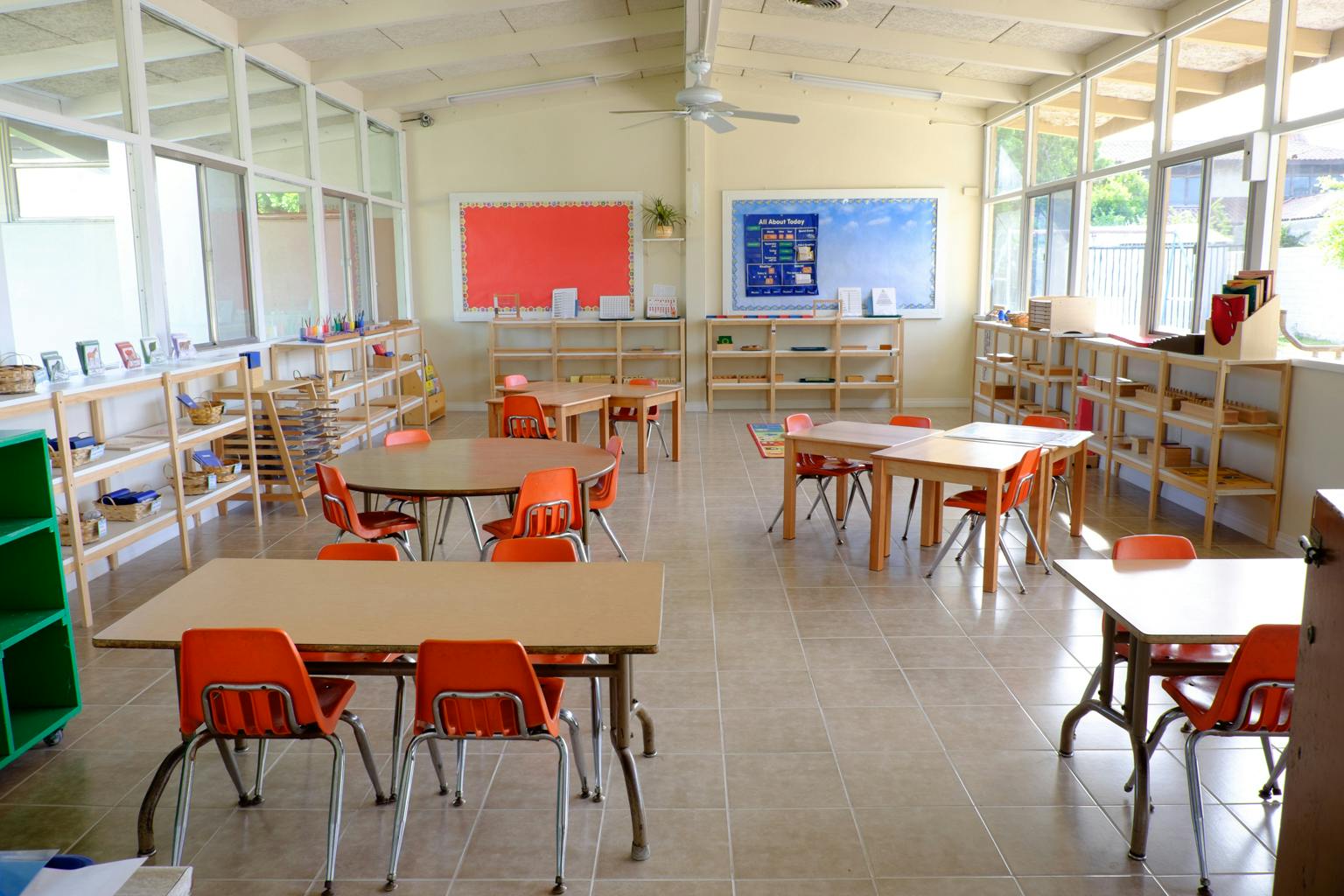Empty classroom with tables and chairs
