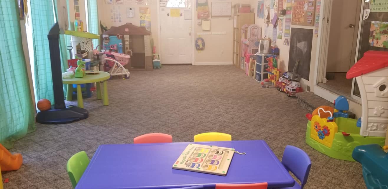 Playroom with small tables and chairs