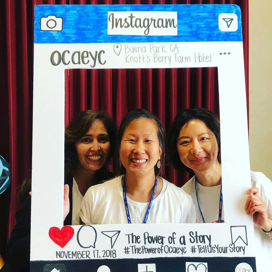 Three people smiling in an Instagram-themed photo frame