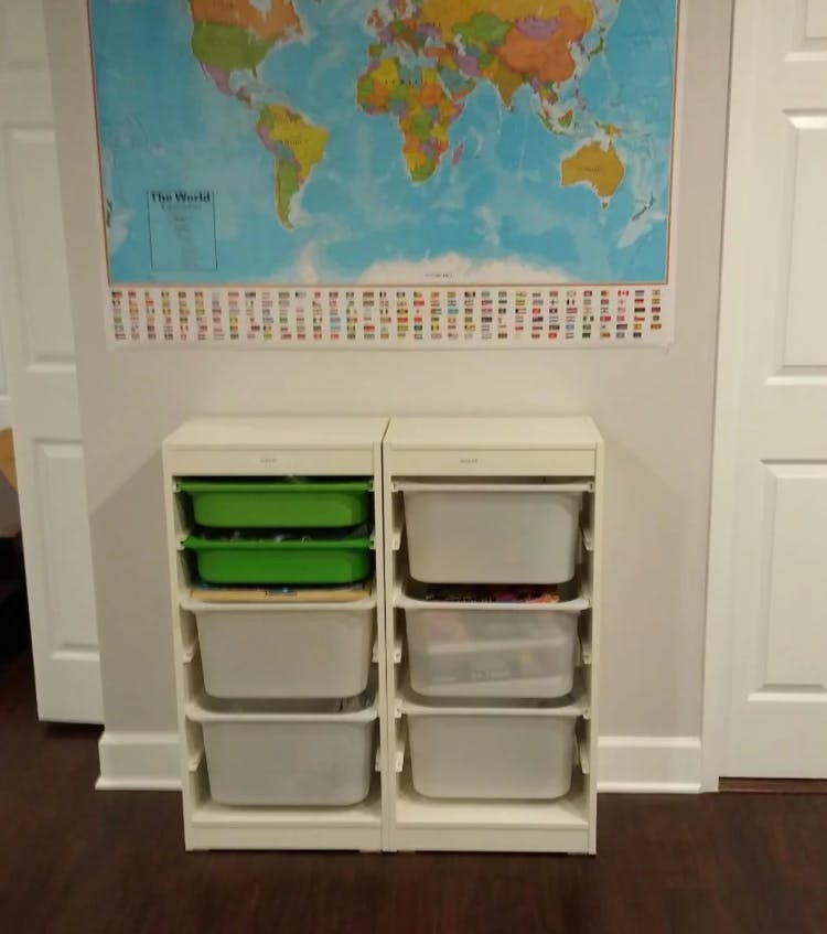 World map above two storage units with bins