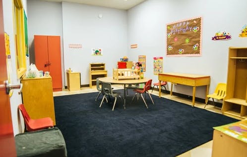 Classroom with small tables and chairs