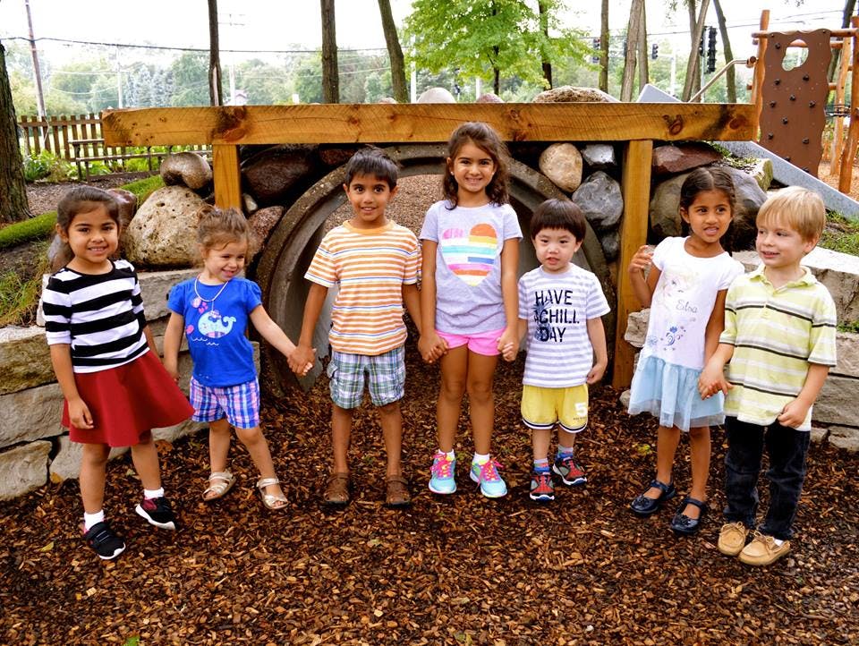 Group of children standing together outdoors