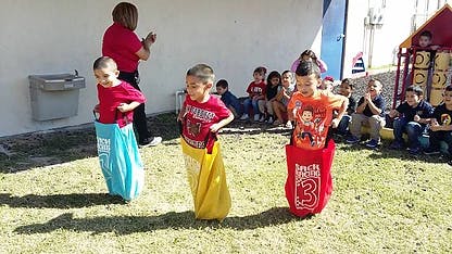 Children in sacks for a sack race