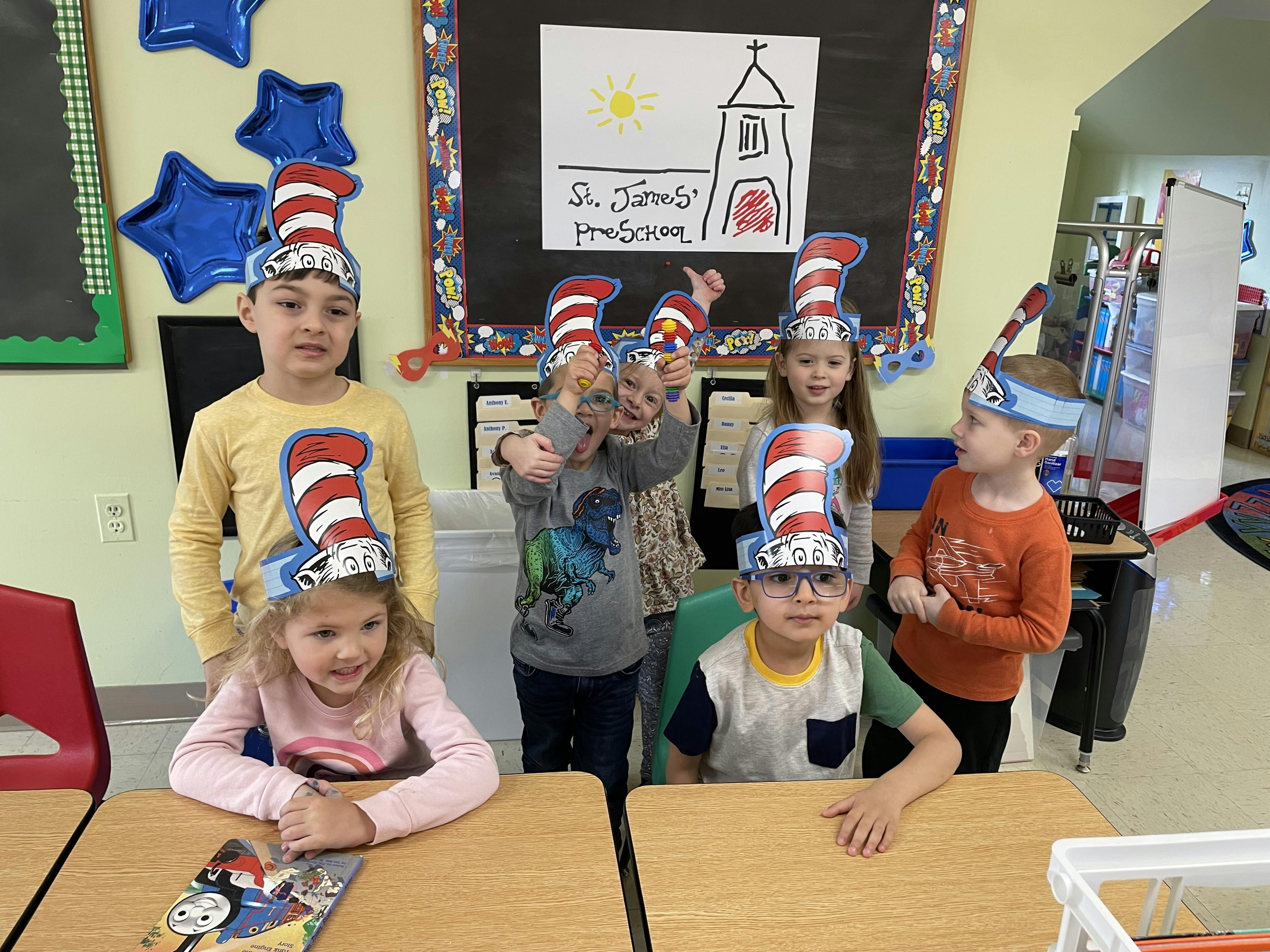 Children wearing Cat in the Hat headbands in a classroom