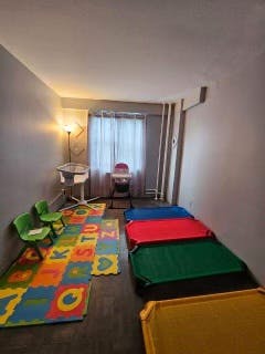 Playroom with colorful floor mats and sleeping mats