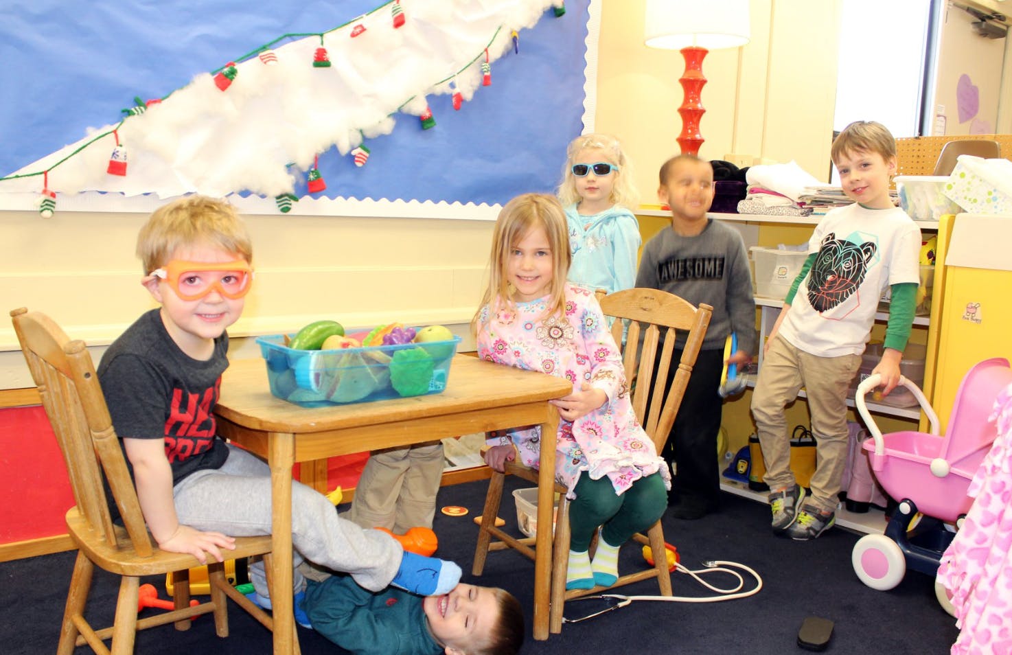 Children playing in a classroom