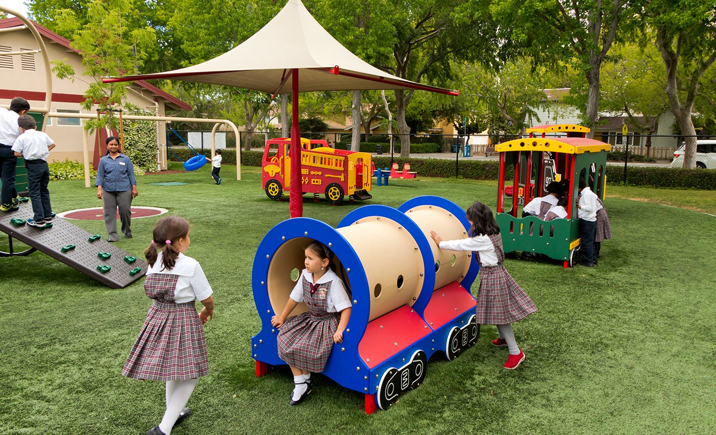 Children playing on playground equipment