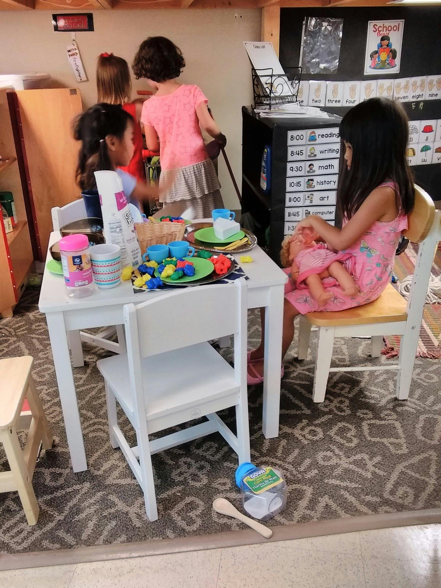 Children playing in a classroom