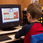 Child looking at a computer screen