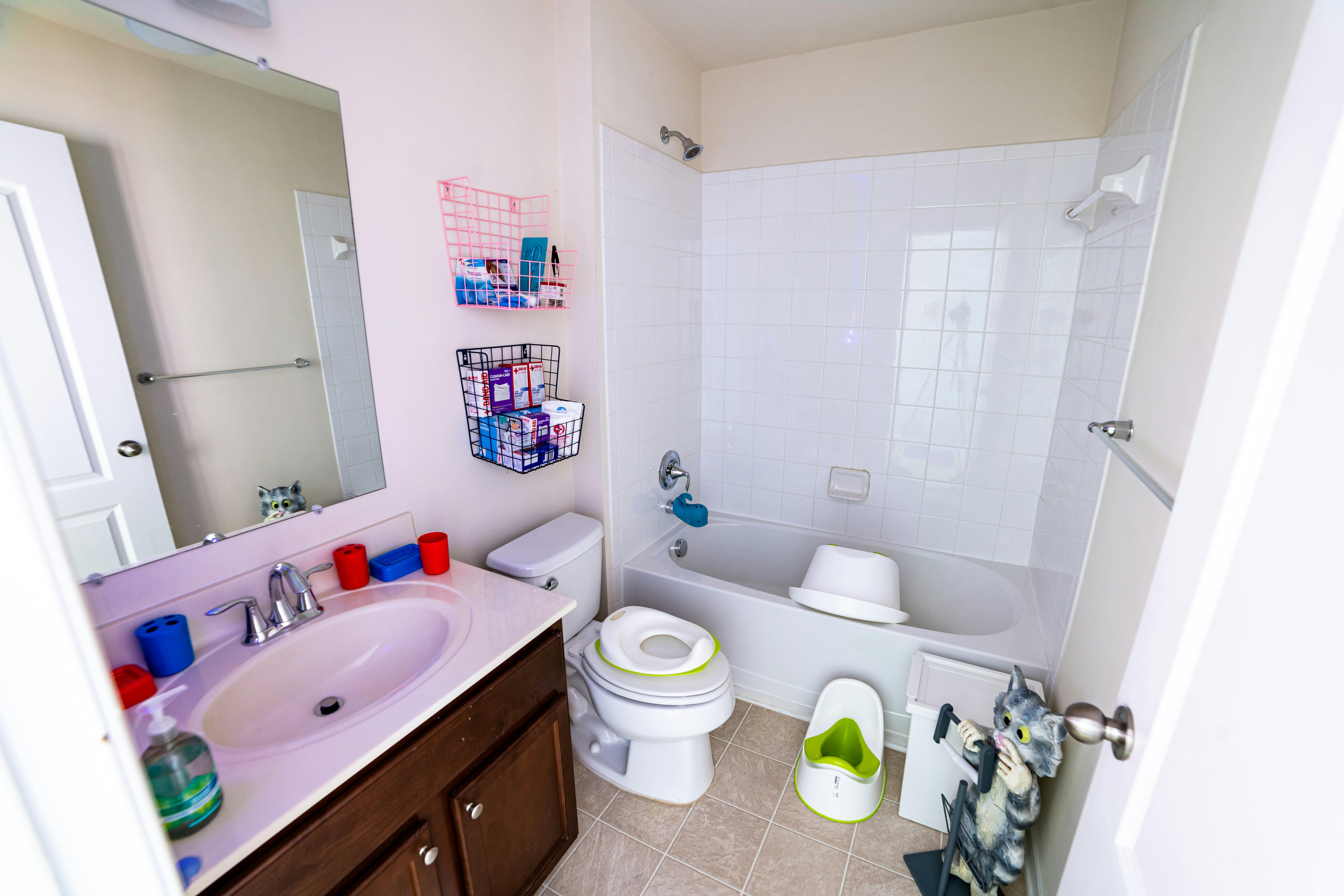 Bathroom with a sink, toilet, and bathtub