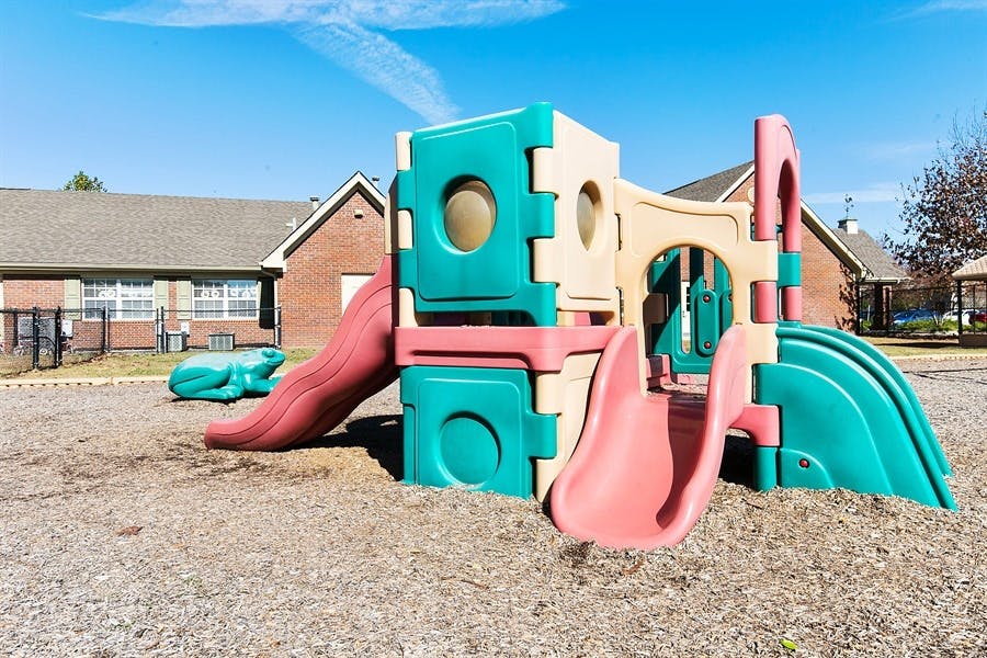 Playground structure with slides and climbing areas