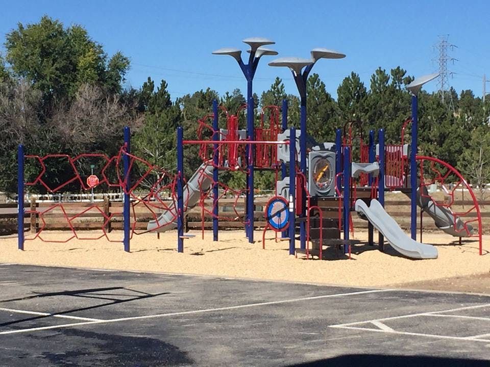 Empty playground with slides and climbing structures