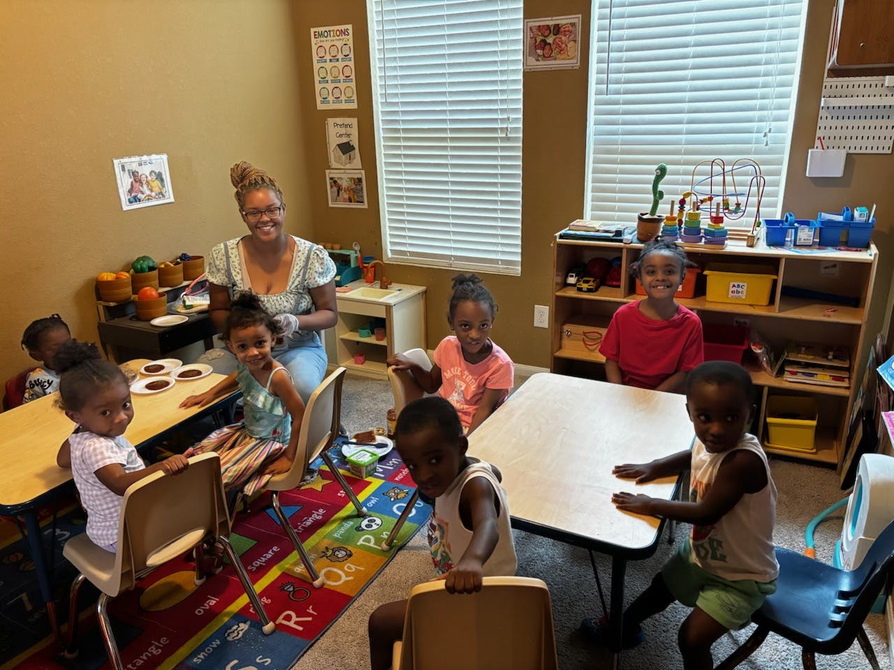 Adult and children in a classroom