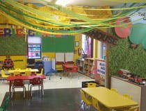 classroom with colorful decorations and small tables