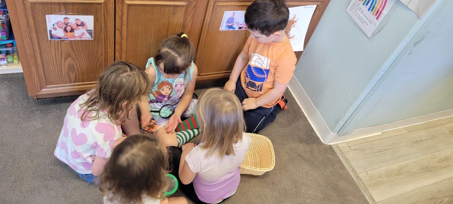 Children sitting on the floor playing