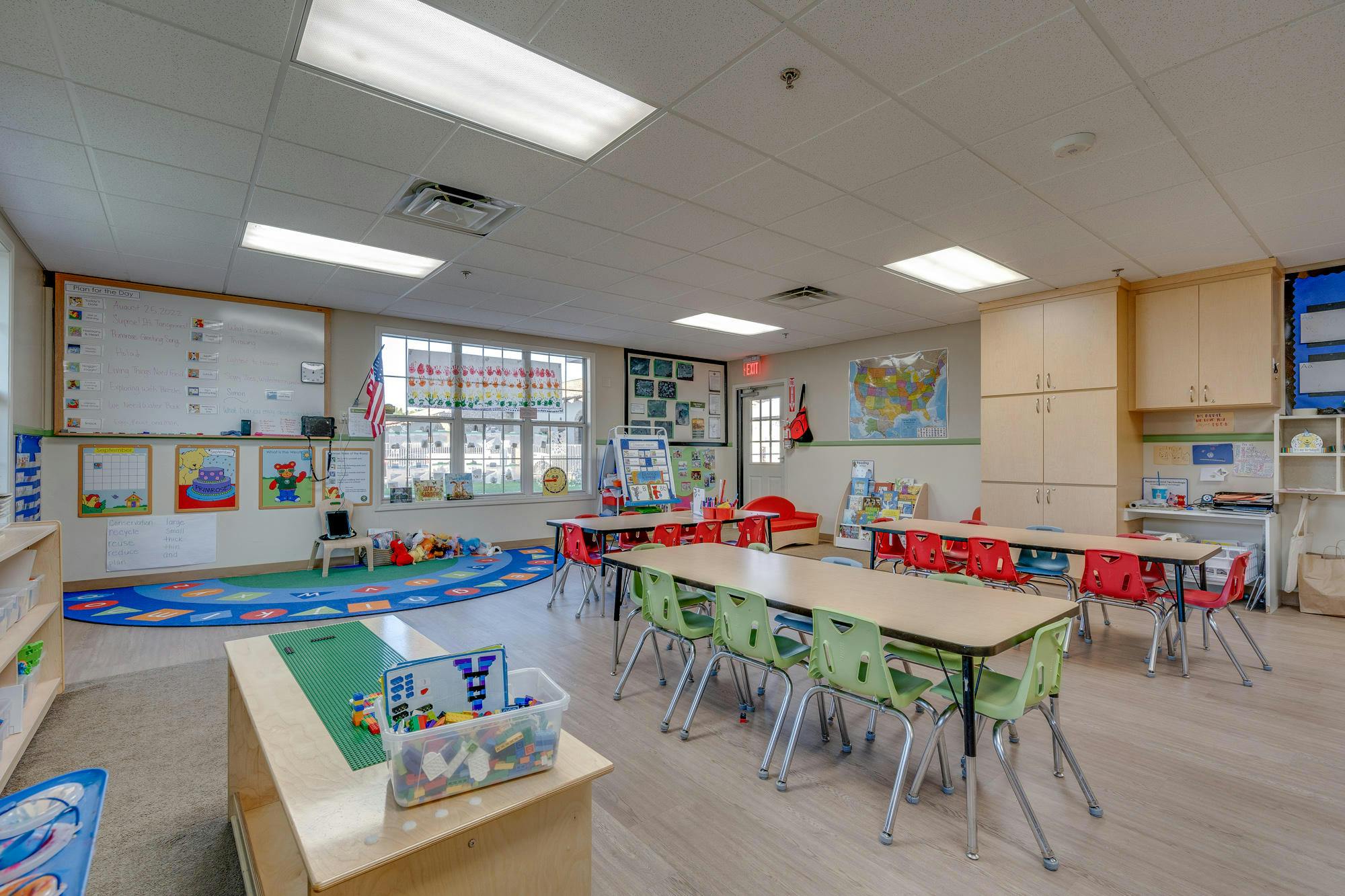 Empty classroom with tables and chairs