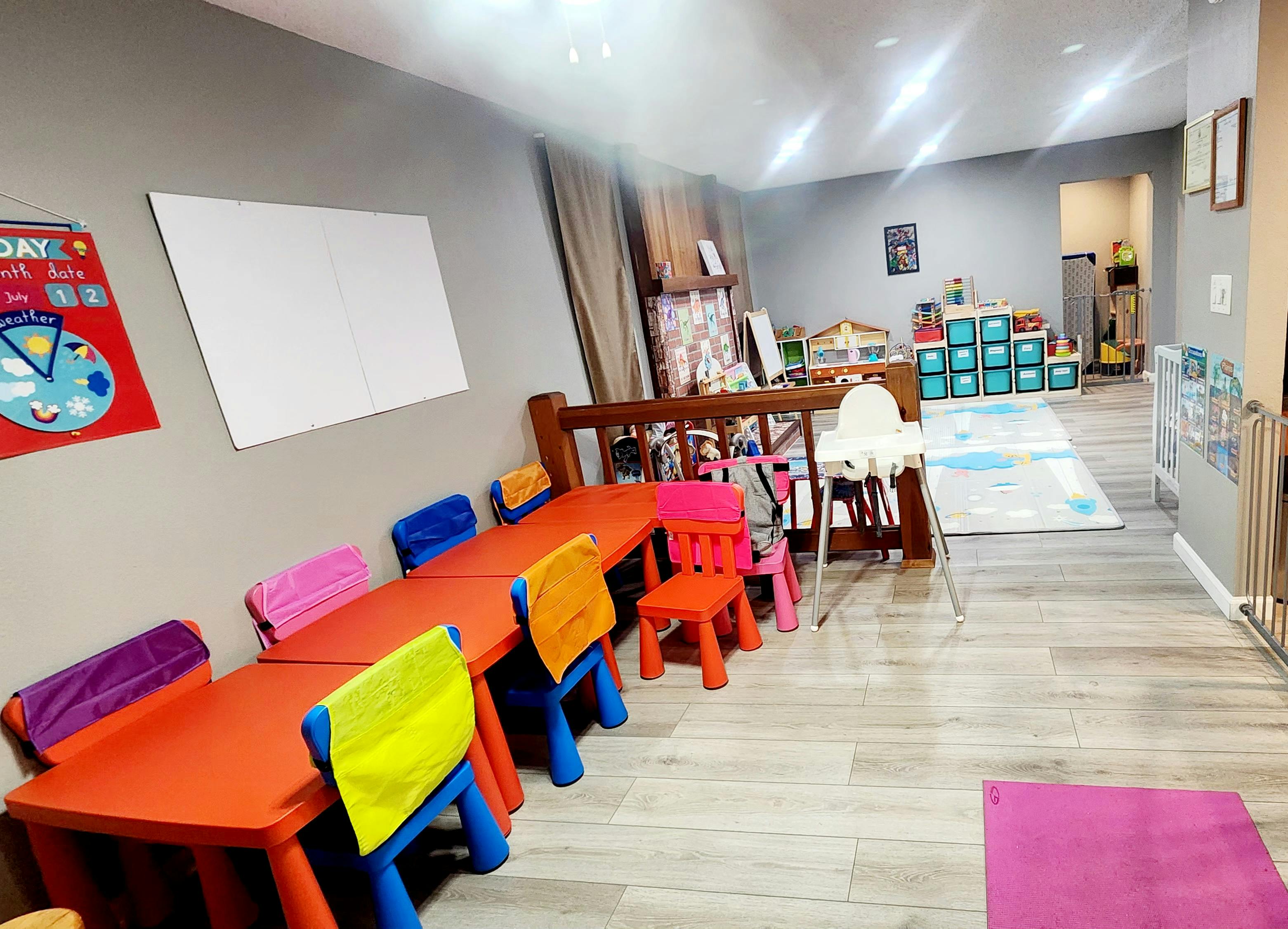 Children's classroom with small tables and chairs