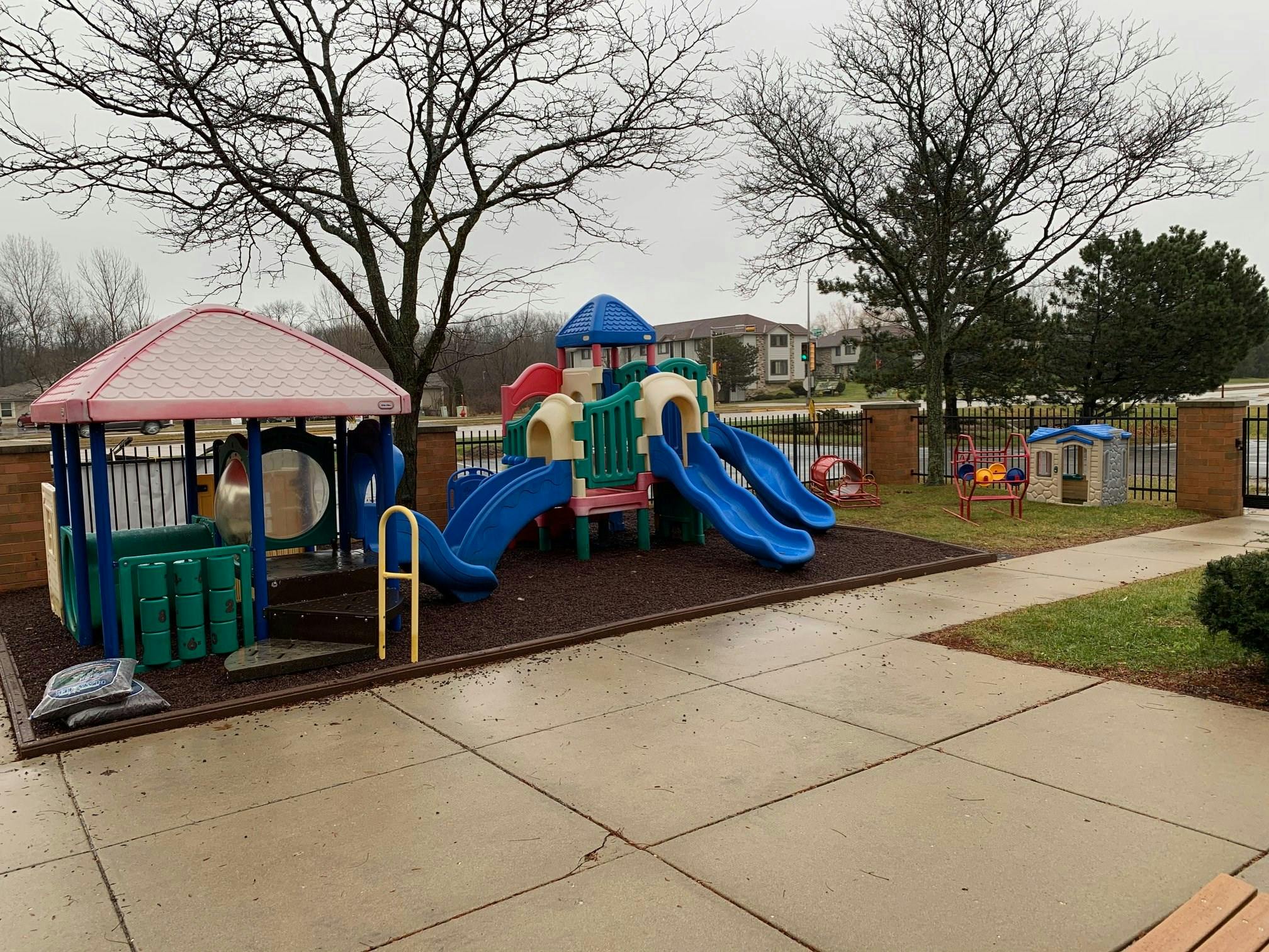 Outdoor playground with slides and play structures