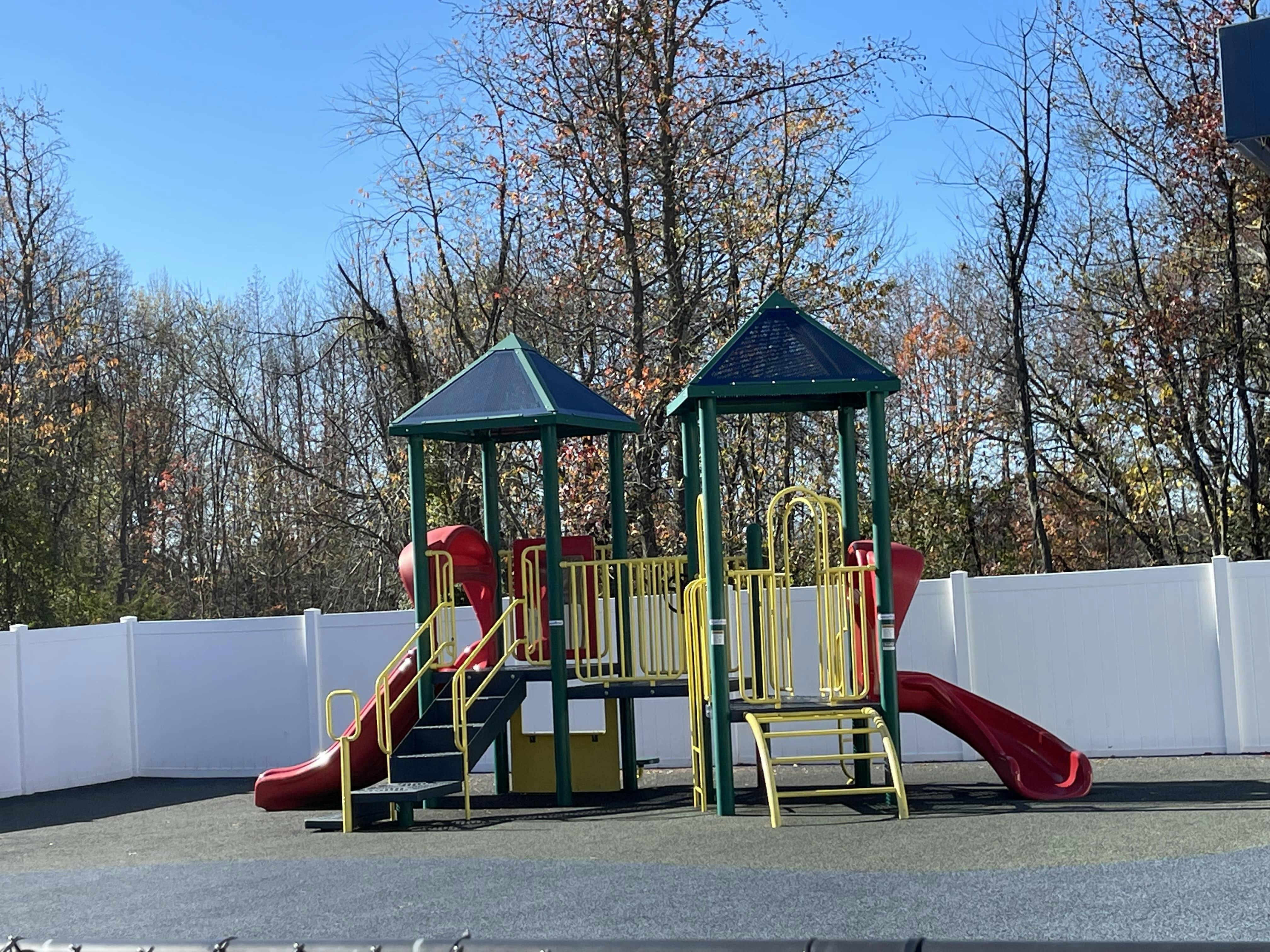 Playground with slides and climbing structures