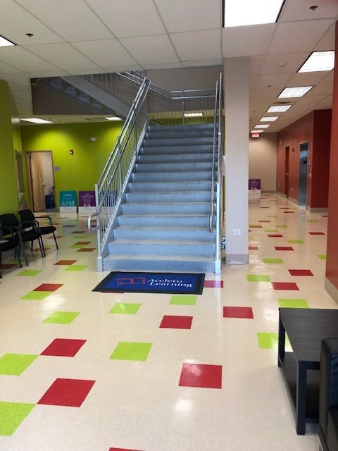 Staircase with metal railings in a building lobby
