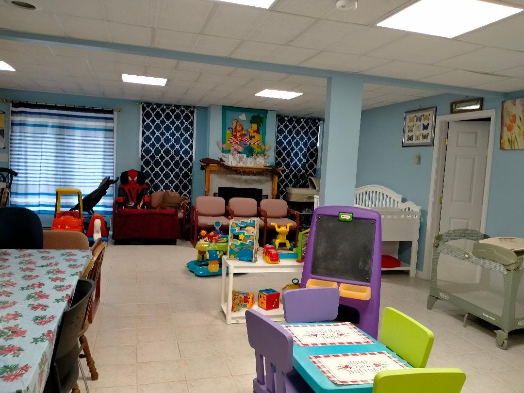 A room with children's furniture and toys