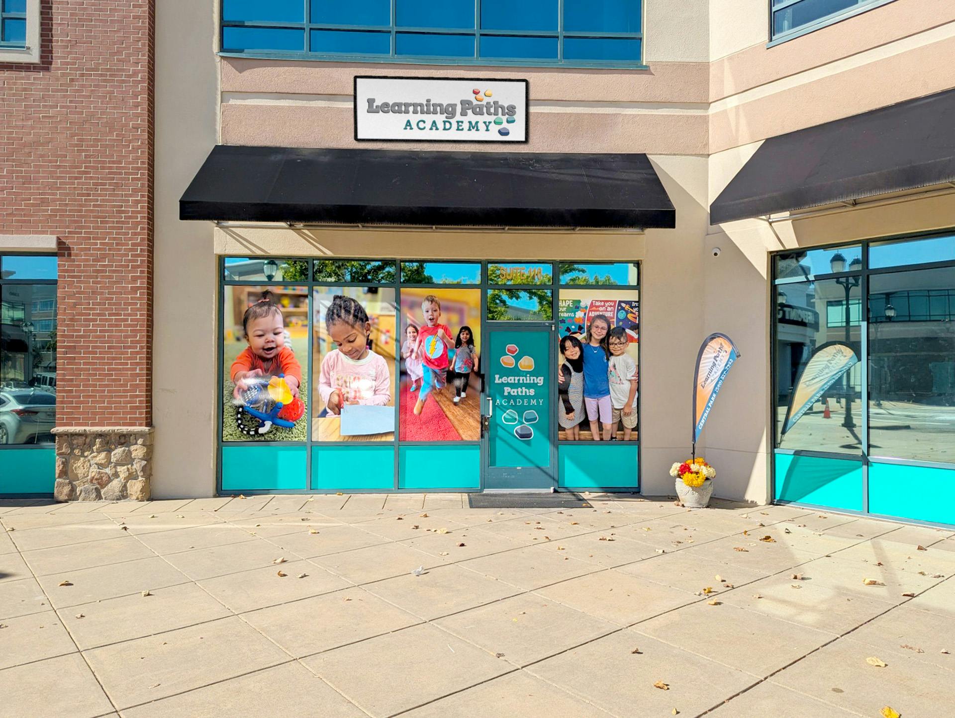 Learning Paths Academy storefront with window displays of children