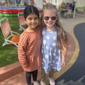 Two children standing together