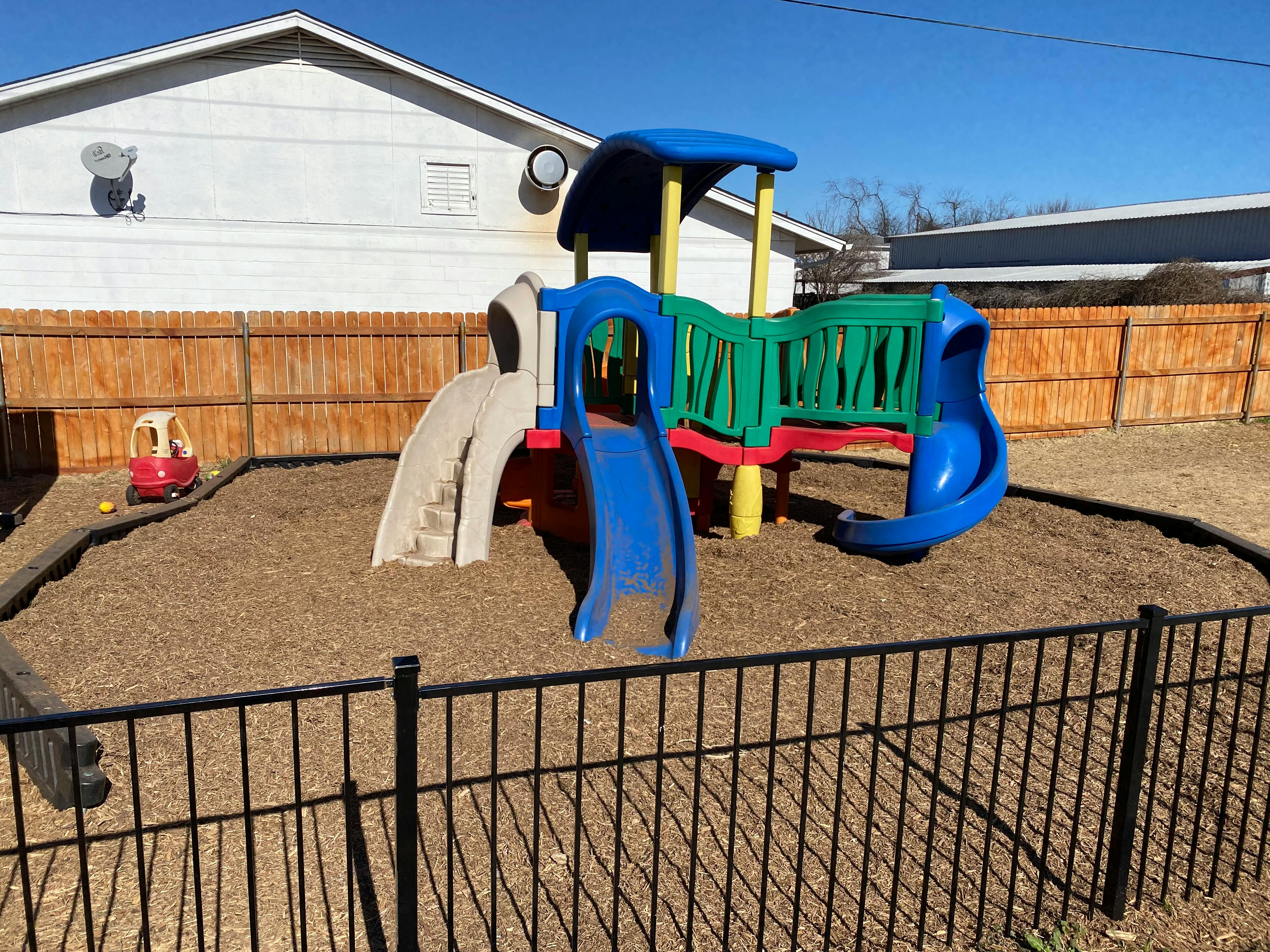 Playground with slides and climbing structure