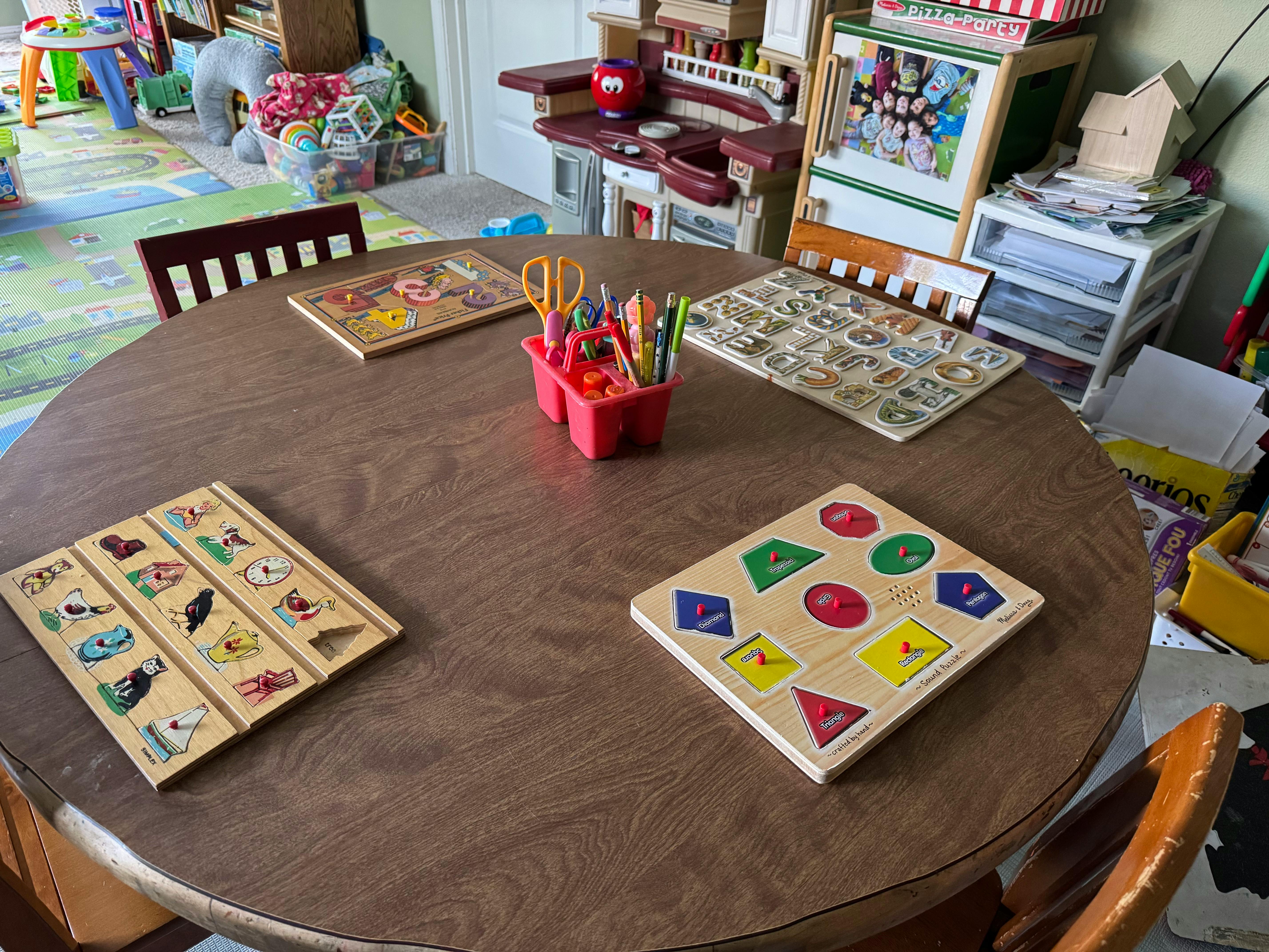Table with puzzles and art supplies