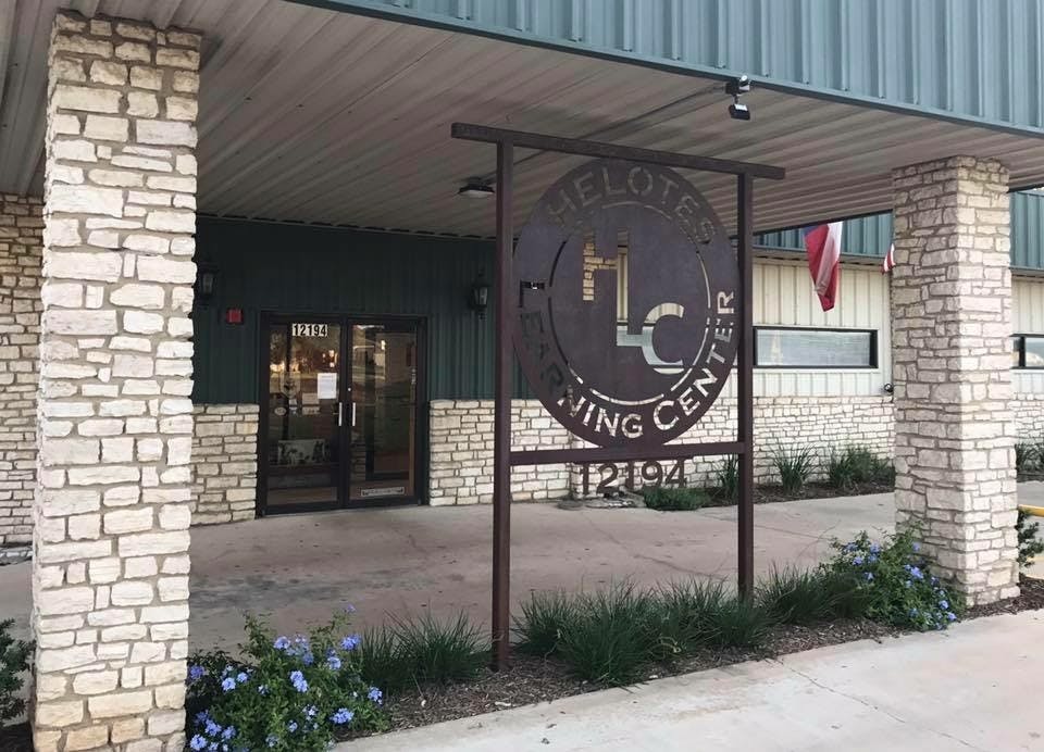 Building exterior with a sign that reads "Living Center"