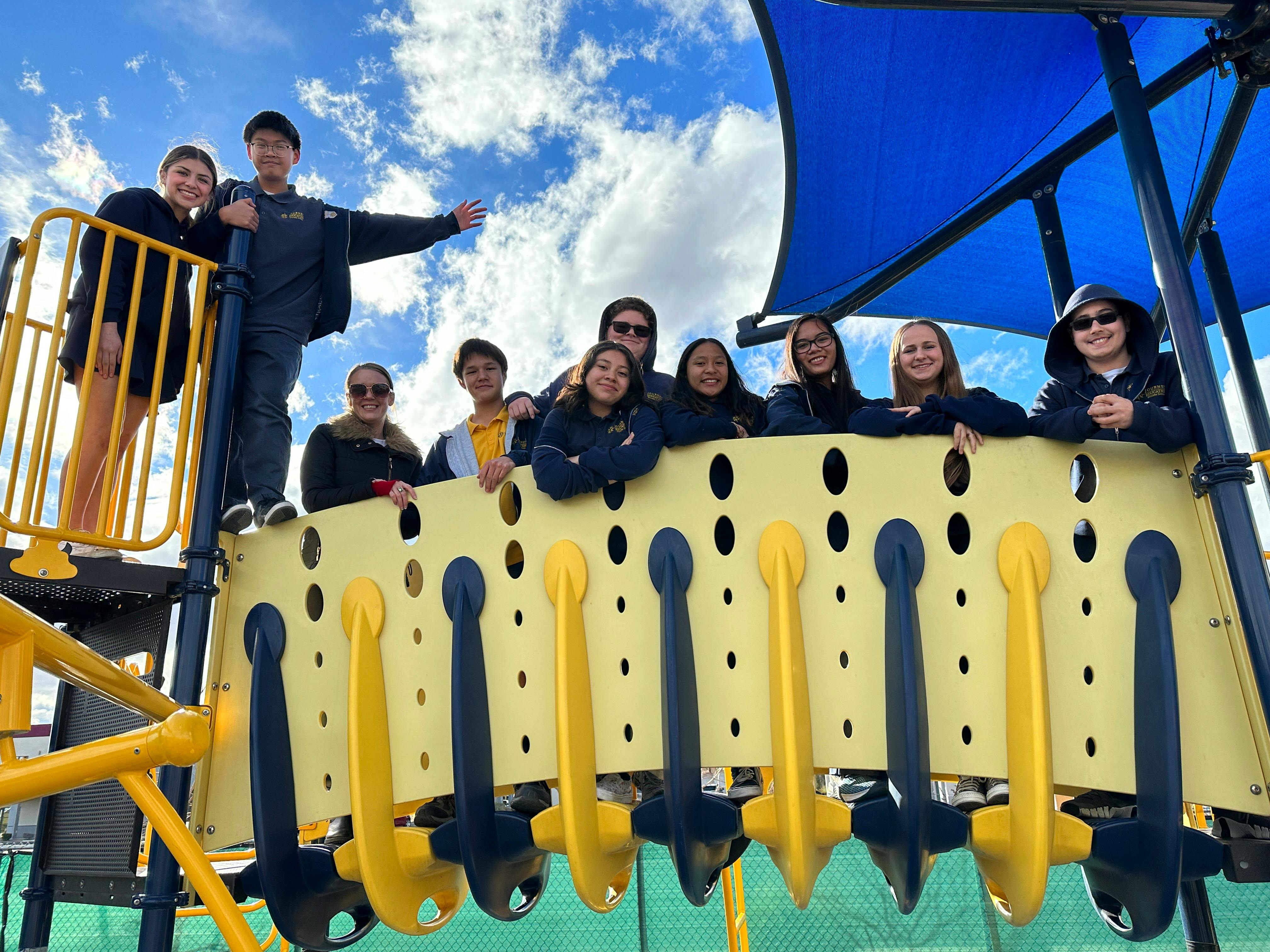 Group of people on a playground structure
