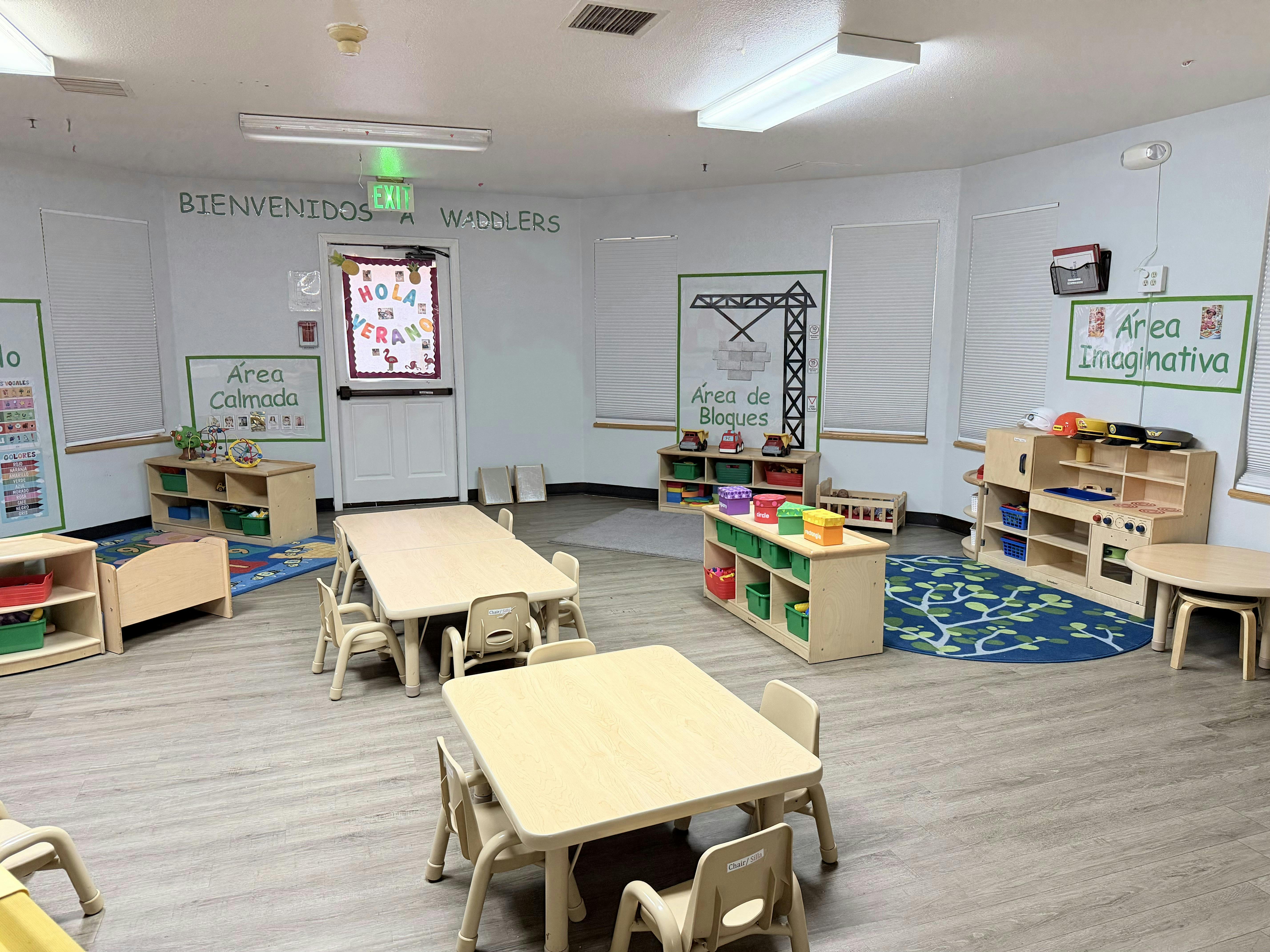 Classroom interior with small tables and chairs for young children