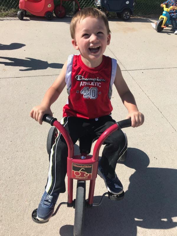 Child on a tricycle