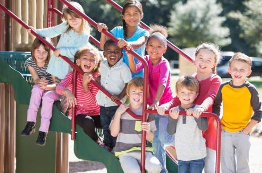 Group of children on a playground structure