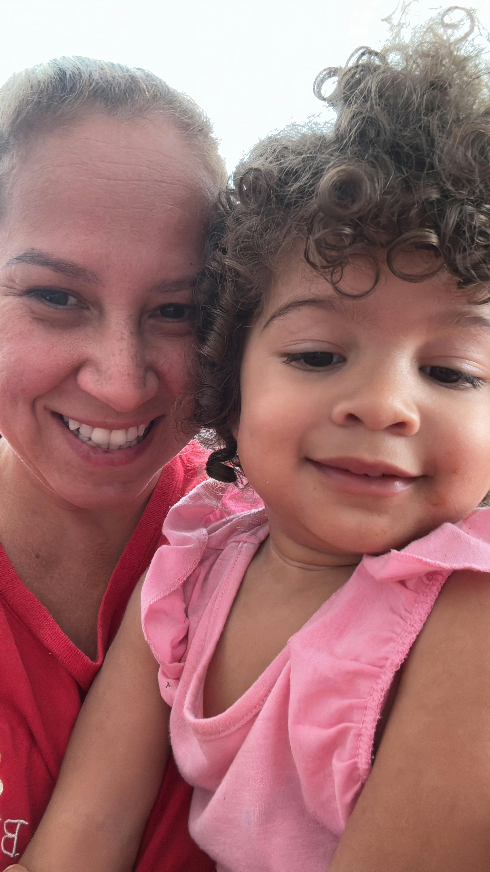 Person and child smiling