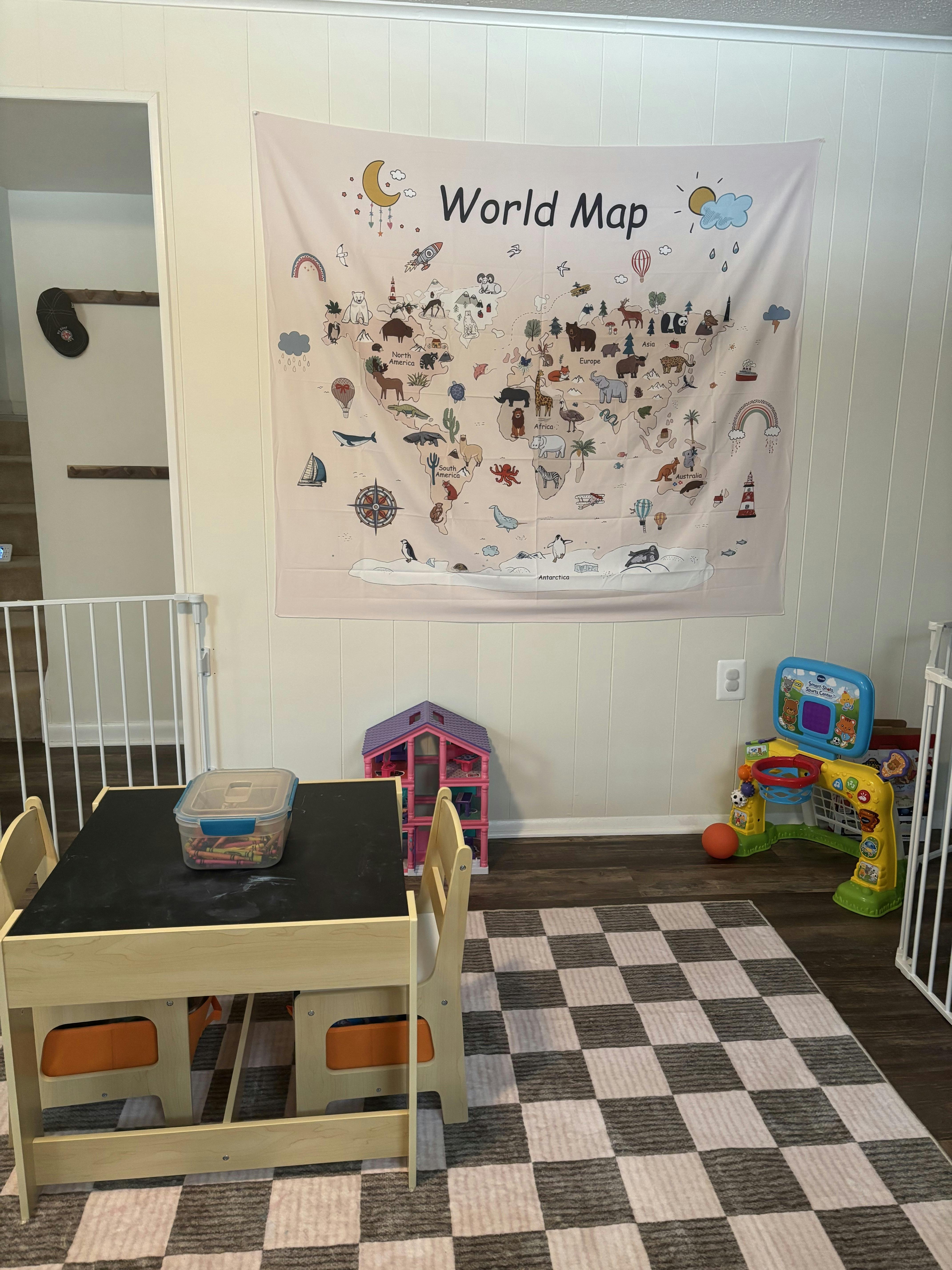 Decorative world map wall tapestry in a child playroom