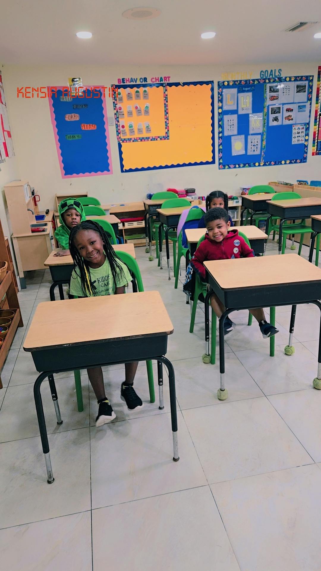 Children sitting at desks in a classroom