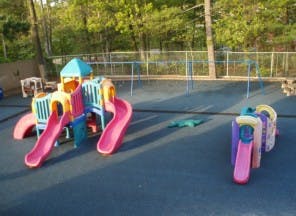 Playground with colorful slides and climbing structures