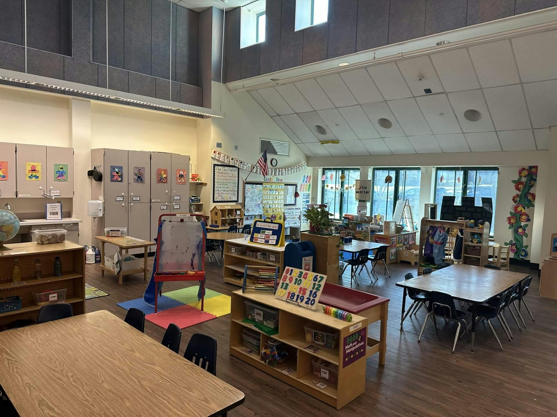 An empty early childhood classroom with multiple activity stations
