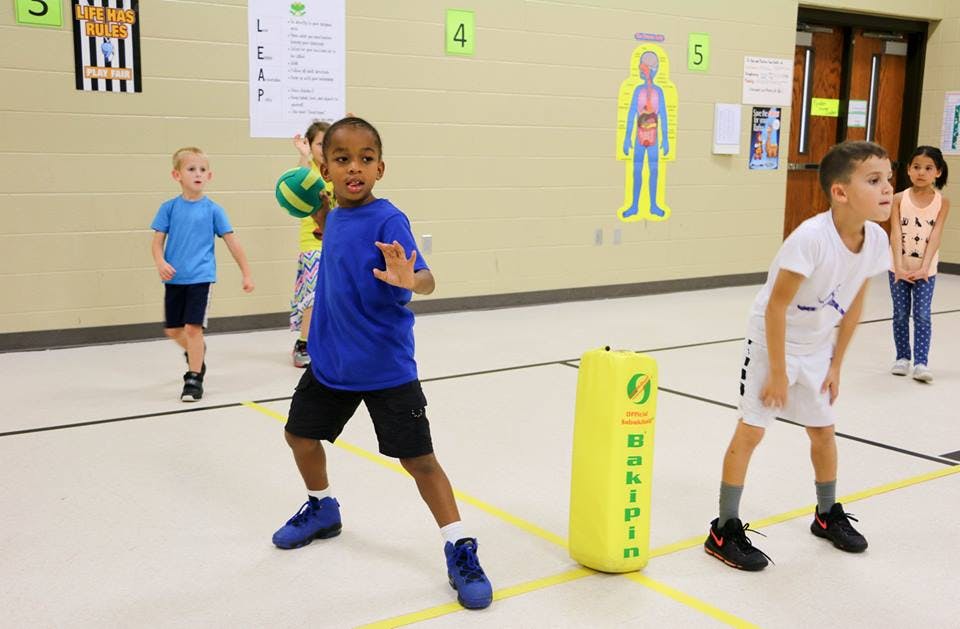 Children playing in a gym