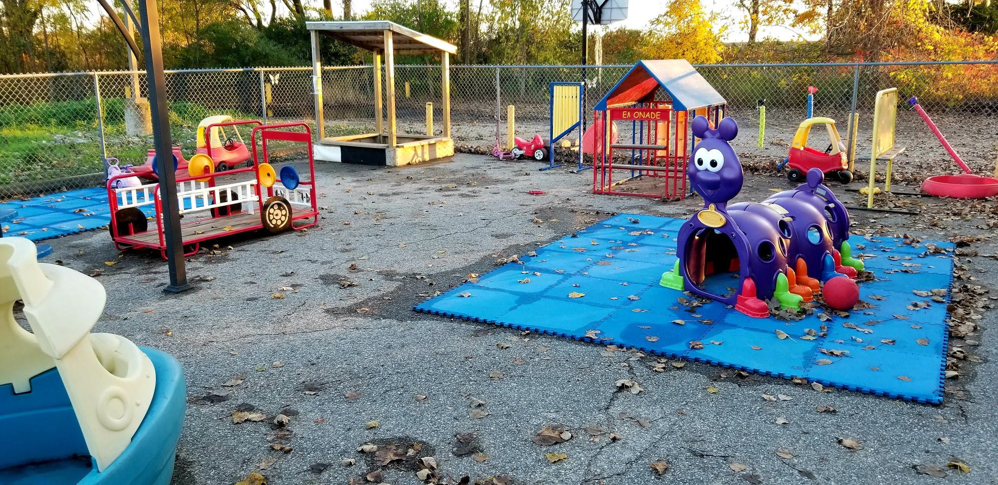 Outdoor playground with various colorful play structures